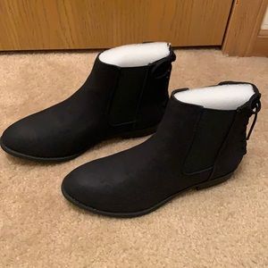 Brand new, never been worn black boots size 8.5